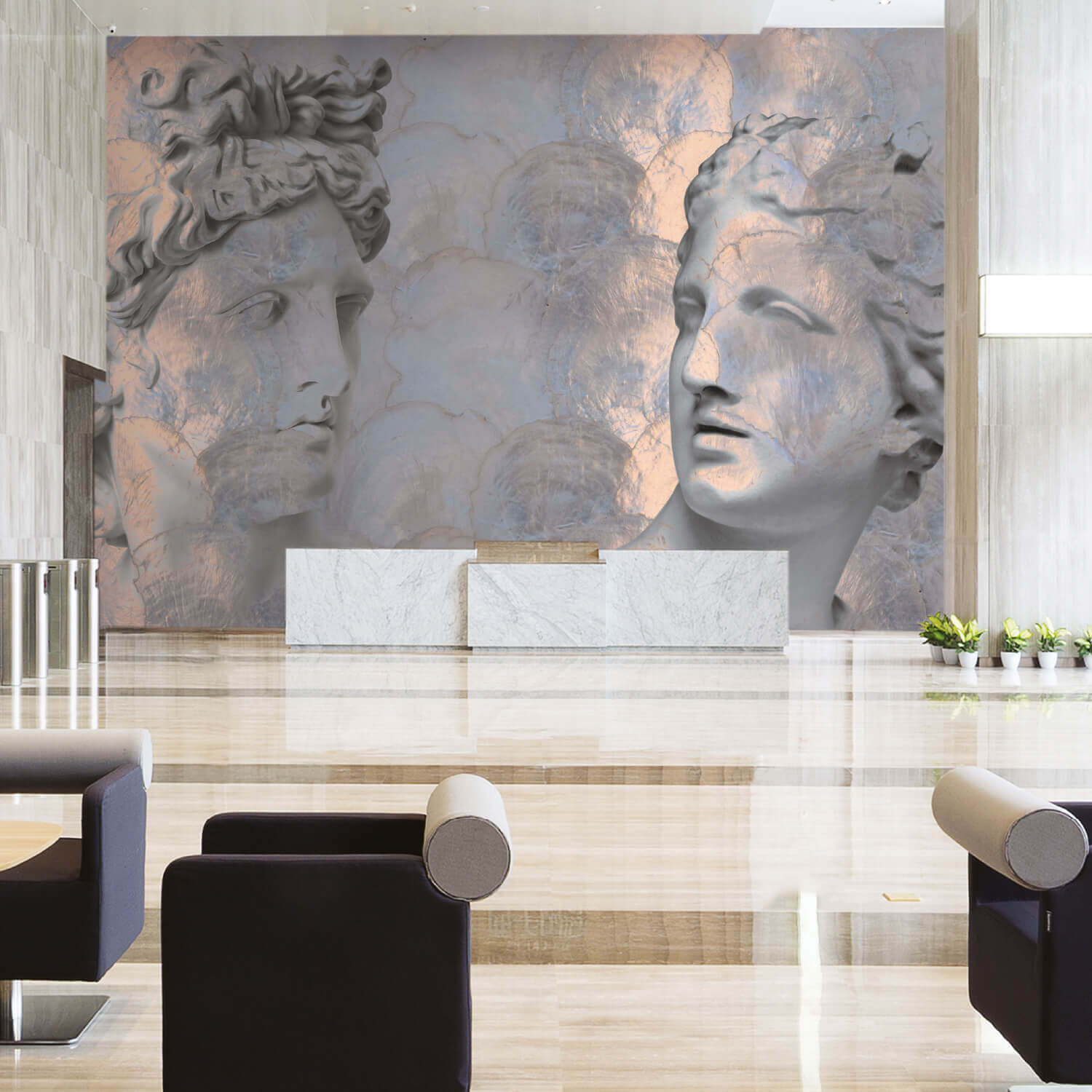 Lobby o reception di un ufficio di lusso. La parete è dominata da un'enorme carta da parati che raffigura le statue in stile greco/romano di due volti (Apollo e Venere), con uno sfondo astratto e marmorizzato in argento e rame.